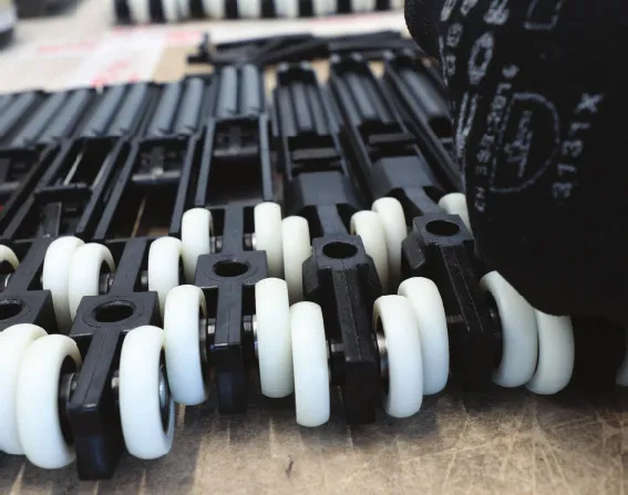 Carriages and wheels for sliding systems, ready for assembly