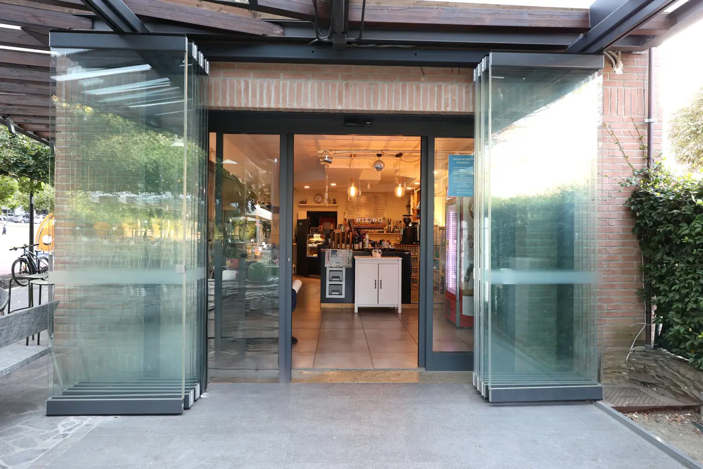 Entrance of a venue enclosed with Folding bi-fold glazing