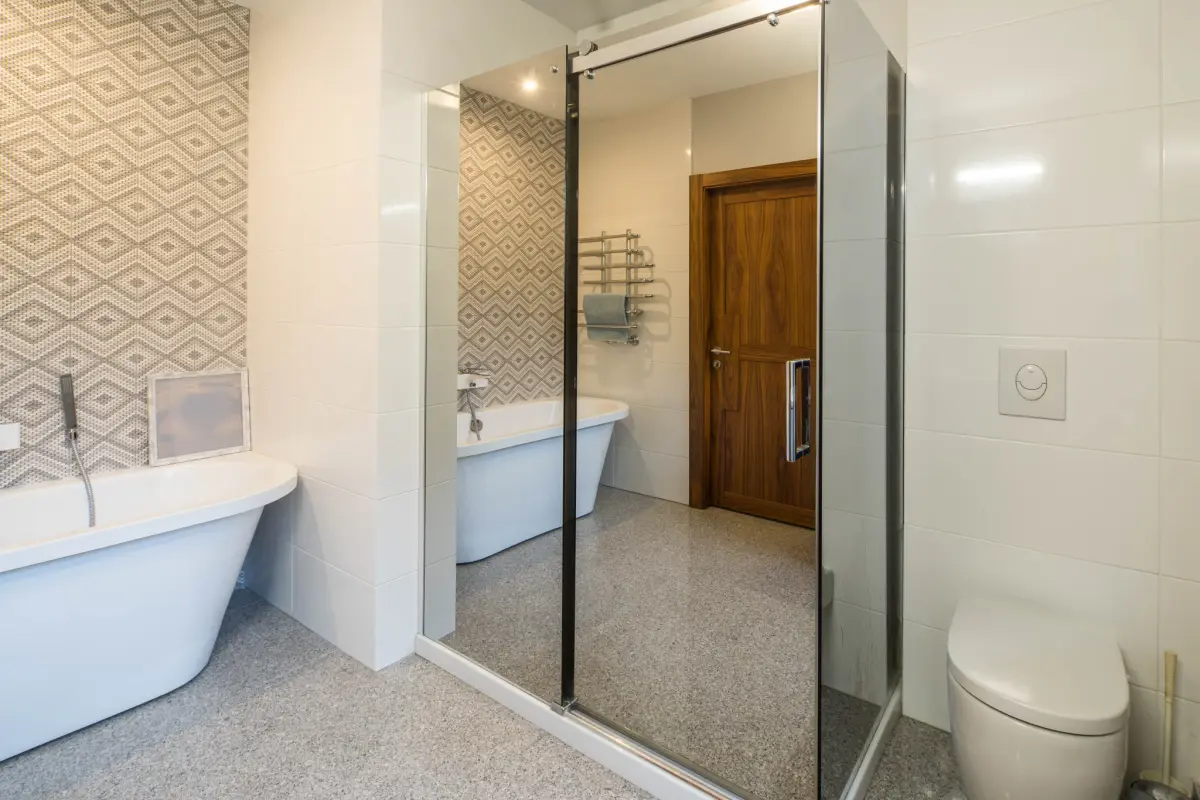 Lux shower screen in a bathroom with a bathtub