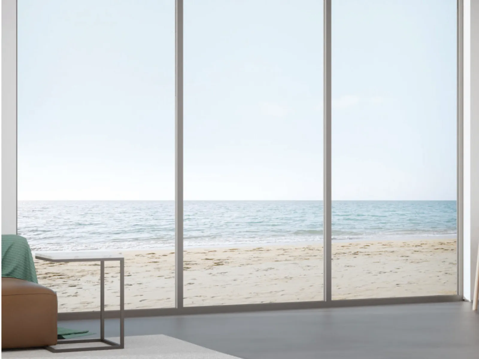 Sliding glazing opening onto the sea