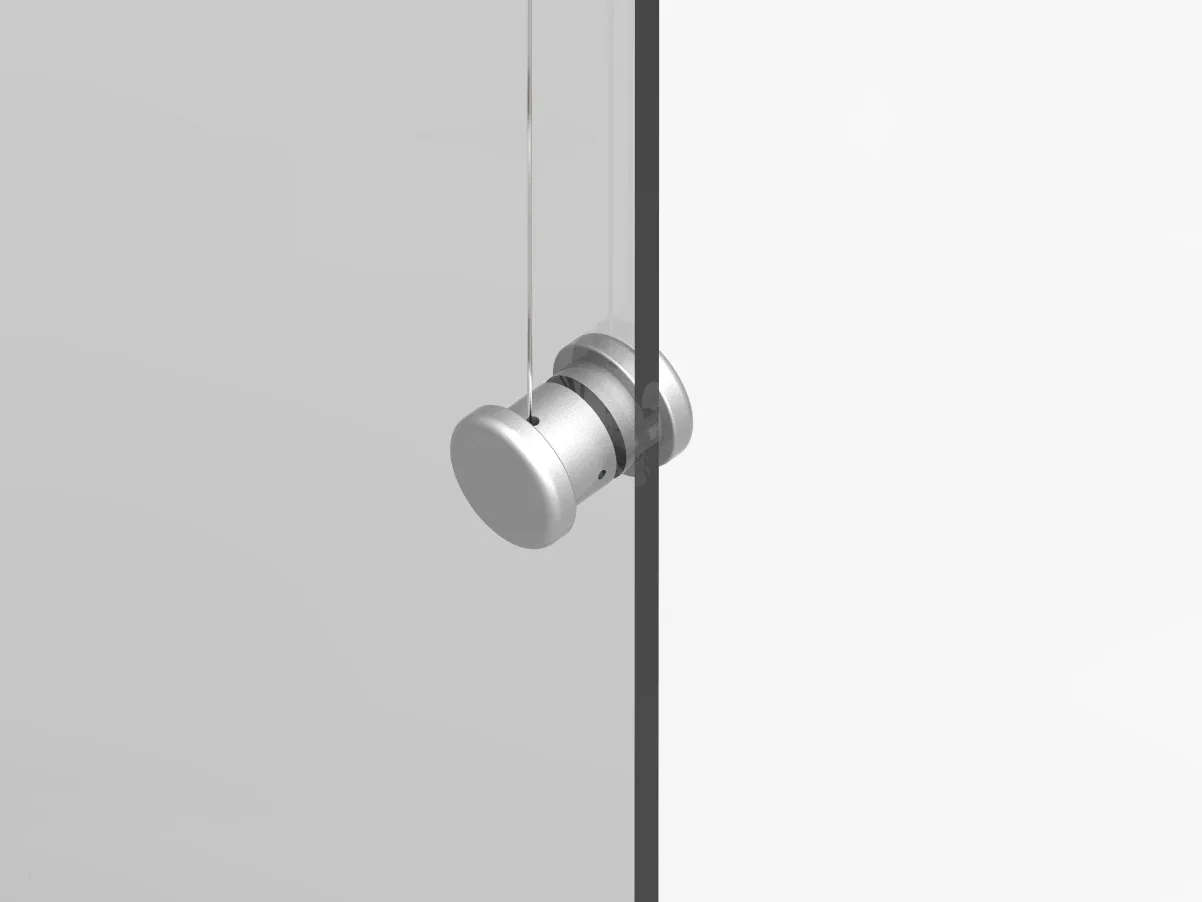Cylindrical knob mounted on a glass panel