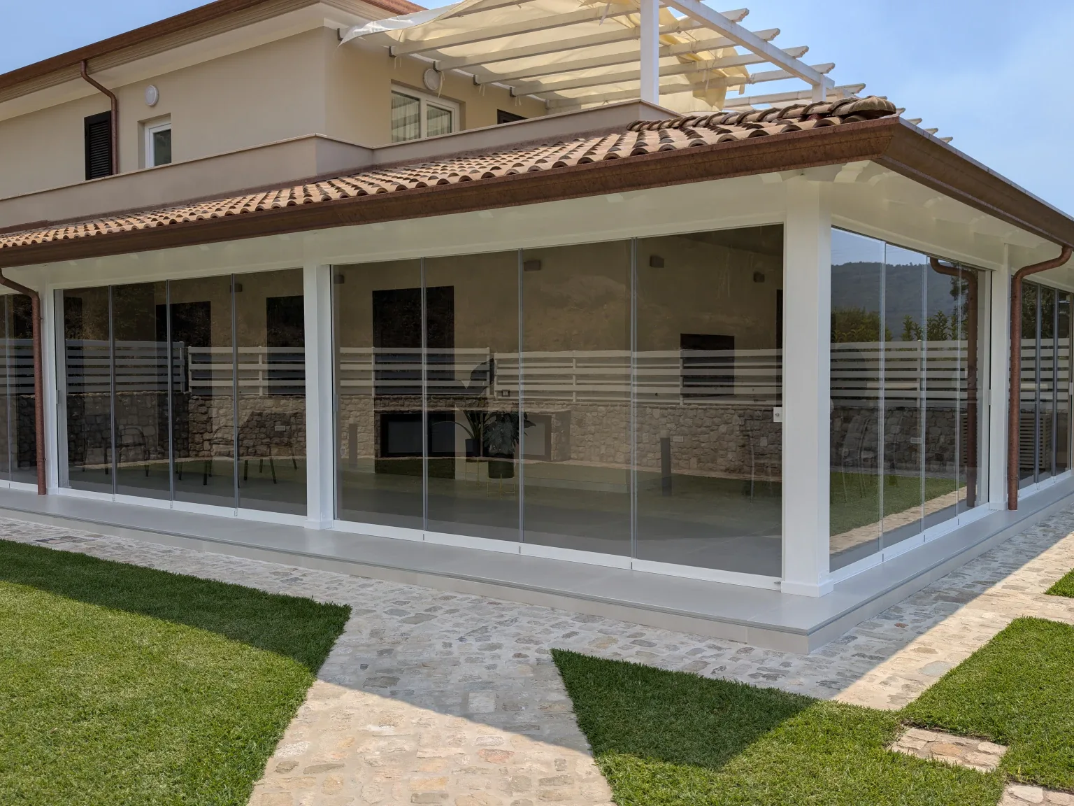 Sliding Floor on a villa porch, panels closed on three sides